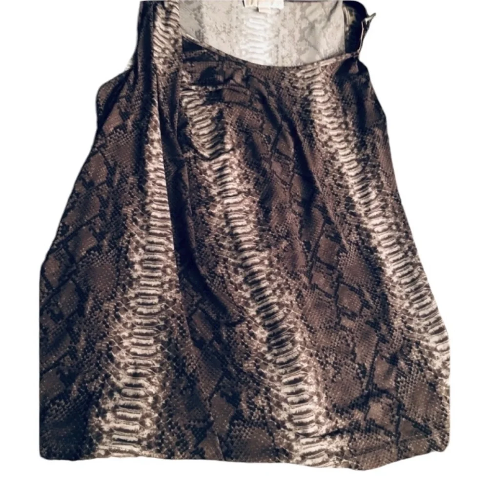 Micheal Kors size XL tan serpent print top ,year round alone or under jacket